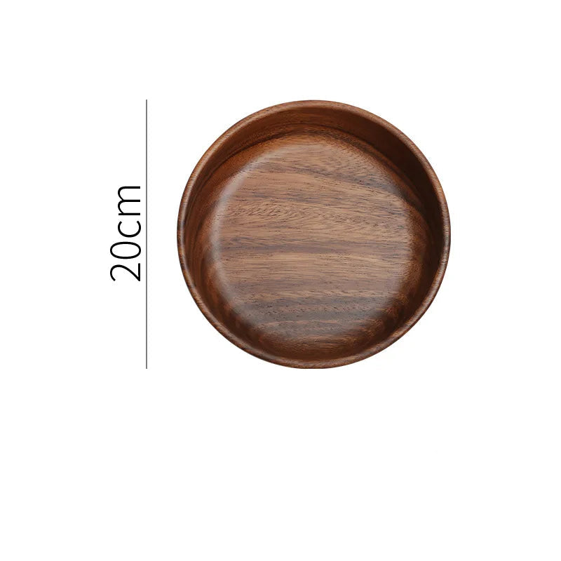 Bol en bois de noyer. Dimensions: 20 cm de diamètre