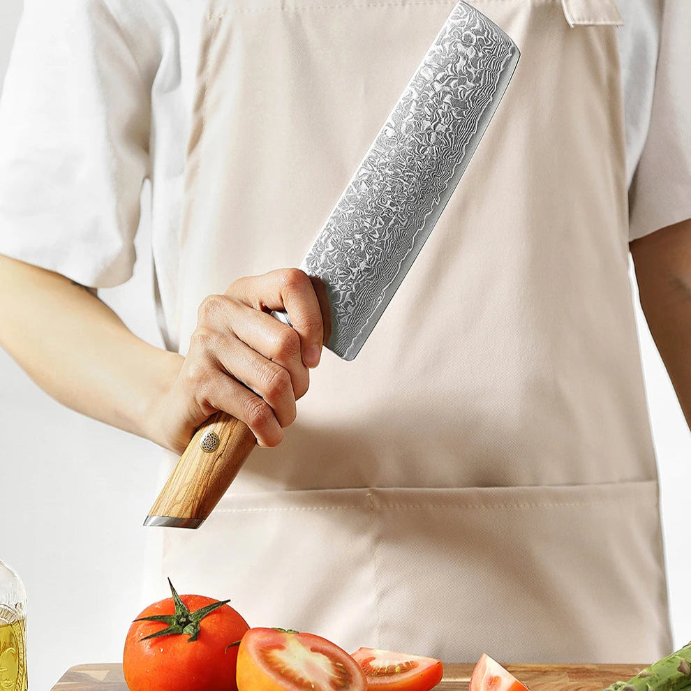 Un couteau d'exception qui vous permet de couper vos aliments avec facilité et précision grâce à sa lame ultra-tranchante et à sa poignée ergonomique en bois d'olivier